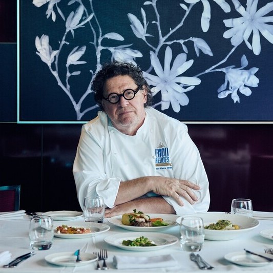 Marco Pierre White showcasing restaurant-quality dishes aboard a P&O Cruises ship, highlighting hospitality and chef careers at sea.